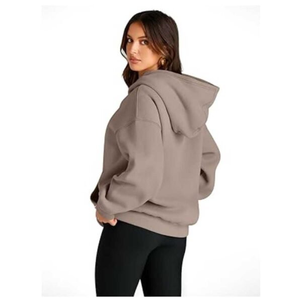 Women's Oversized Hoodie with hands in pockets, cozy and stylish