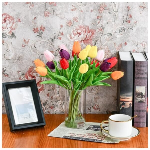 Elegant glass vase with lifelike artificial tulips for home and office decoration