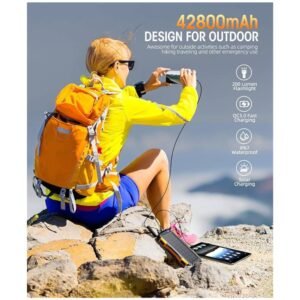 Portable 42800mAh Power-Bank-Solar-Charger used in outdoor environment with sunlight and nature background