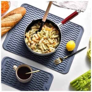Food-grade Silicone Dish Drying Mat used as a heat-resistant trivet for hot pots and pans
