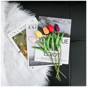 Elegant glass vase with lifelike artificial tulips for home and office decoration
