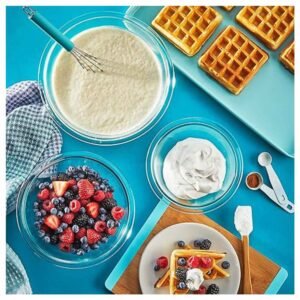 clear bowls being used in the kitchen for mixing ingredients or serving food