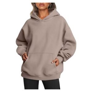 Women's Oversized Hoodie with hands in pockets, cozy and stylish.