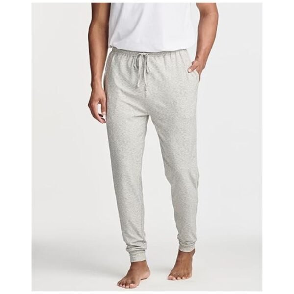 Model wearing Men's Pajama Joggers, showcasing the slim fit and cozy fabric in a casual setting