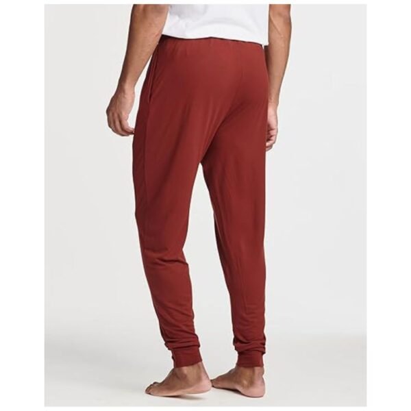 Model wearing Men's Pajama Joggers, showcasing the slim fit and cozy fabric in a casual setting