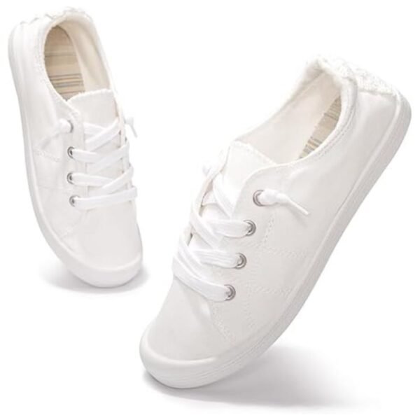 Full view of women's slip-on canvas shoes with a minimalist, classic design, perfect for casual outfits and everyday wear.