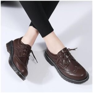 Woman wearing stylish lace-up shoes with a vintage feel, paired with casual outfit for everyday wear.