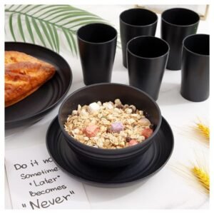 Supernal dinnerware set displayed on a table with food and drinks