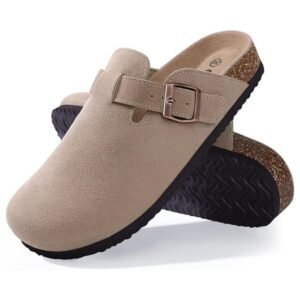 Women's suede leather clogs with adjustable buckle and cork footbed, showcasing the classic design