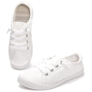Full view of women's slip-on canvas shoes with a minimalist, classic design, perfect for casual outfits and everyday wear.