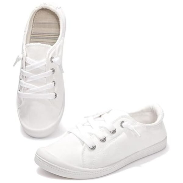 Full view of women's slip-on canvas shoes with a minimalist, classic design, perfect for casual outfits and everyday wear.