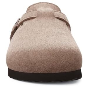 Close-up of the front view of women’s suede leather clogs with adjustable buckle and arch support