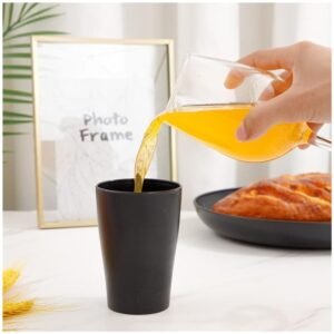 Supernal dinnerware set displayed on a table with food and drinks