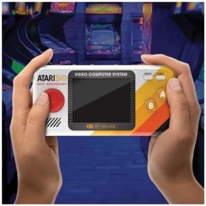 Child holding My Arcade Atari Pocket Player Pro handheld gaming console.