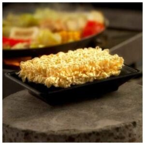 Non-cooked BP Wok Noodles ready for preparation, showcasing their fresh and authentic appearance
