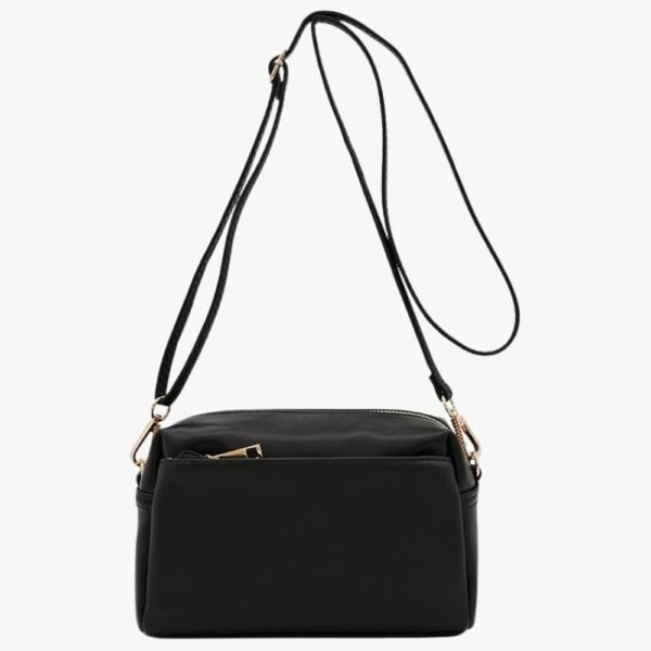 Front and side view of the FashionPuzzle Triple Zip Small Crossbody Bag showcasing its sleek design and gold-tone hardware.