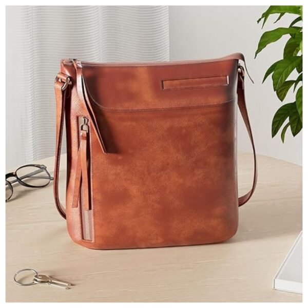 Full view of a leather crossbody bag for women, highlighting its sleek design and stylish appeal.