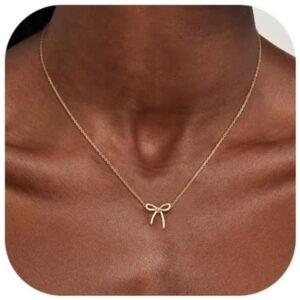 Close-up of 14K gold bow necklace for women, showcasing its trendy design.