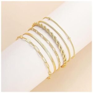 Variety of 14K gold bracelets: Cuban link and paperclip.