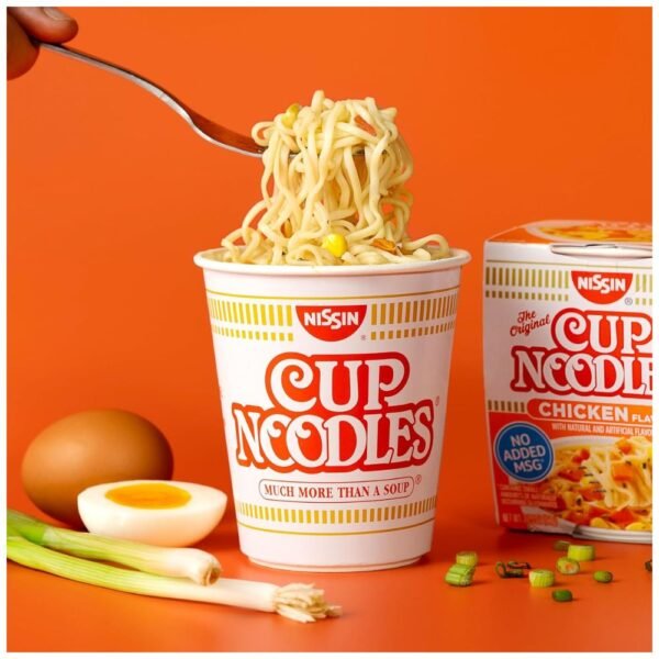 A bowl of Nissin Cup Noodles Soup, cooked and ready to enjoy with the savory chicken broth and noodles