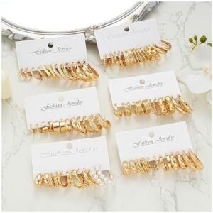 All 36 pairs of gold hoop earrings displayed together, offering a variety of sizes and designs.