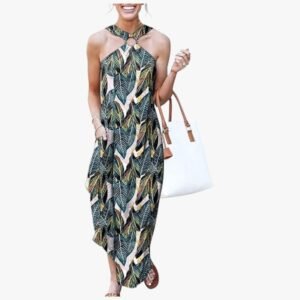 Women's summer halter neck maxi dress front view, featuring a criss-cross ring front, racerback, and side slit.