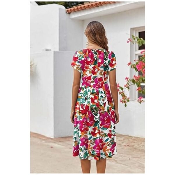 Women's casual pleated flare dress back view, highlighting the flowy hemline and simple, elegant design