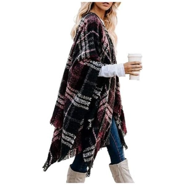 Full view of the women's knitted poncho shawl with color-block design, open front, and tassel details, perfect for fall and winter.