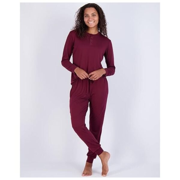 Woman modeling a stylish 2-piece lounge set with a long sleeve top and jogger pants, perfect for sleep and casual wear.