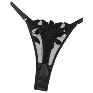 A close-up image focusing on the intricate floral embroidery details on the satin fabric of the lingerie set