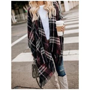 Model showcasing the women's poncho shawl wrap, styled with jeans and a casual top, highlighting its versatility and cozy design.