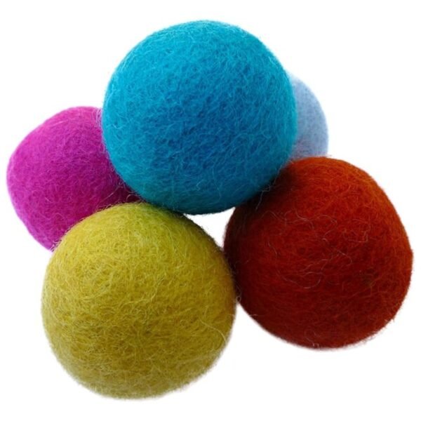 Image showcasing vibrant wool cat balls in rainbow colors, ideal for playful cats