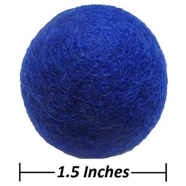 Close-up displaying the 1.5-inch size of the wool cat balls, comparable to a golf ball.