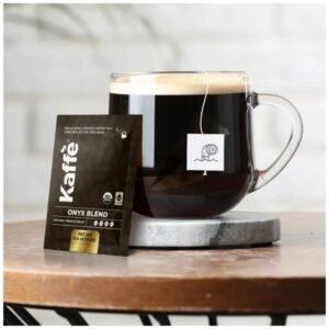 Freshly brewed Onyx Blend French Roast Coffee in a cup, highlighting its deep, rich color and robust aroma