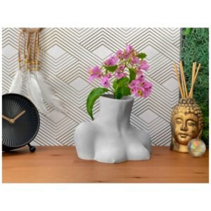 Large female body vase – artistic concrete boob vessel for home decor.