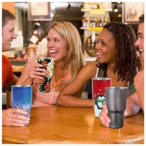 Stainless steel tumbler on a work desk, perfect for keeping coffee hot during office hours
