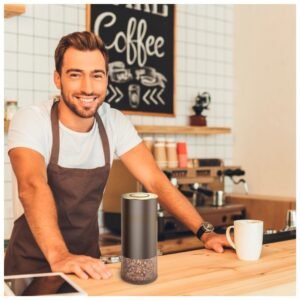 Kaffe Glass Coffee Canister holding fresh coffee beans, keeping them sealed and fresh.