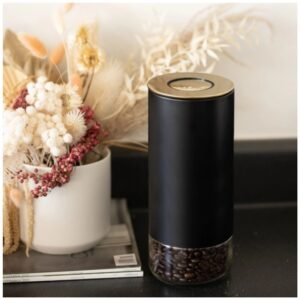 Kaffe Glass Coffee Canisters placed on a kitchen counter, adding style and organization.